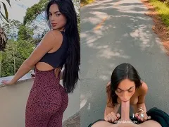 Brunette suçant son petit ami dans la rue